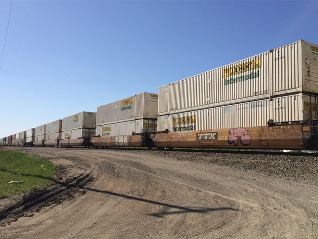 The International Longshore and Warehouse Union (ILWU) contract extension with the Pacific Maritime Association, which represents the West Coast interests, is good news for ag shippers. The shippers lost money and customers in past labor disputes because of the slowdowns severely affecting their shipments, such as these containers at Fargo, North Dakota. (DTN photo by Mary Kennedy)